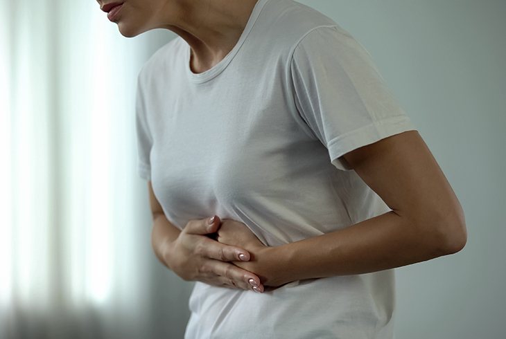 stomach pain and bloating after overeating, bulimia problem